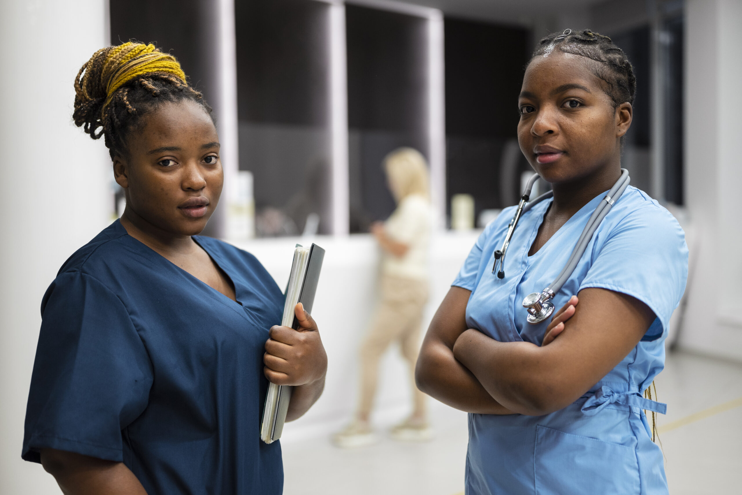 medium shot black nurses work scaled.jpg
